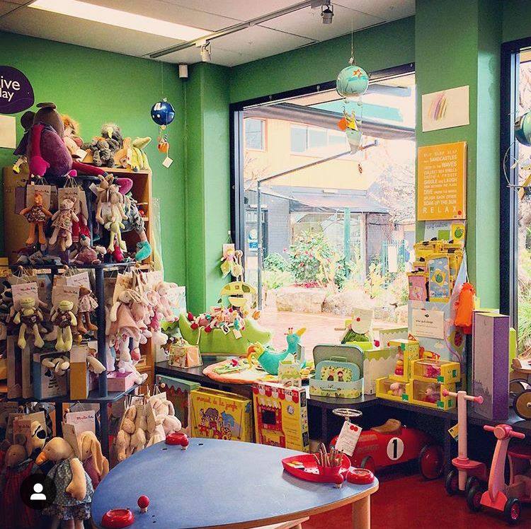 interior of shop showing toys in window and on display